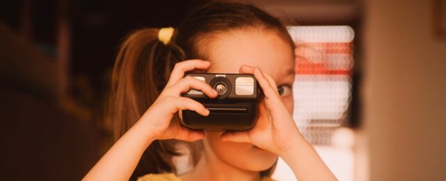 Girl With Instant Camera