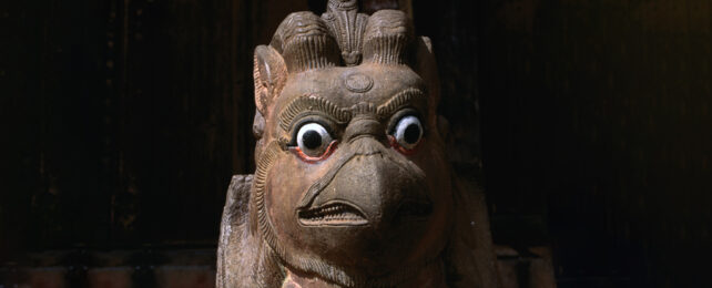 Close up of griffin statue bird head