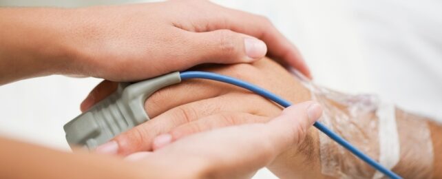 Hands Being Held In Hospital